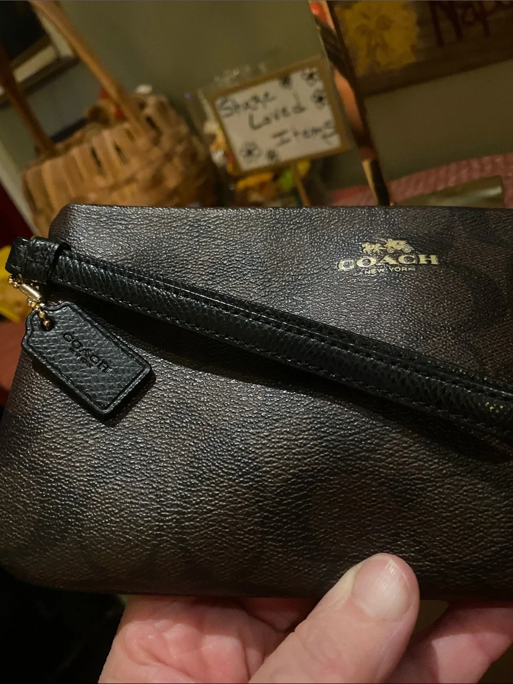 Coach Large Corner Zip Wristlet with signature brown canvas monogram